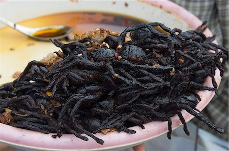 spider - Cooked spiders for sale in market, Cambodia, Indochina, Southeast Asia, Asia Stock Photo - Rights-Managed, Code: 841-02947327