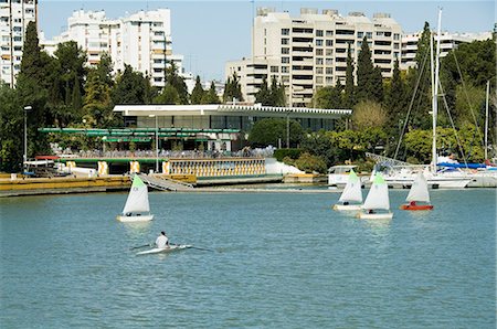 rio skyline - Sailing boats and sailing club in the background on the river Rio Guadalquivir, Seville, Andalusia, Spain, Europe Stock Photo - Rights-Managed, Code: 841-02994171