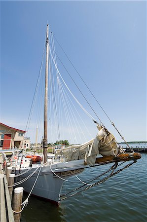 st michael - Restored historic Skipjack sailing boat, Chesapeake Bay Maritime Museum, St. Michaels, Talbot County, Miles River, Chesapeake Bay area, Maryland, United States of America, North America Stock Photo - Rights-Managed, Code: 841-02994514