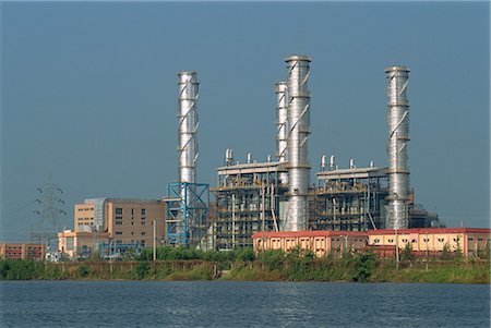 Chemical plant located on the Backwaters, Kerala state, India, Asia Stock Photo - Rights-Managed, Code: 841-02991494