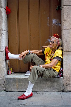 simsearch:841-07081838,k - Old lady smoking cigar, Calla Empedrado, Havana, Cuba, West Indies, Central America Stock Photo - Rights-Managed, Code: 841-02991986
