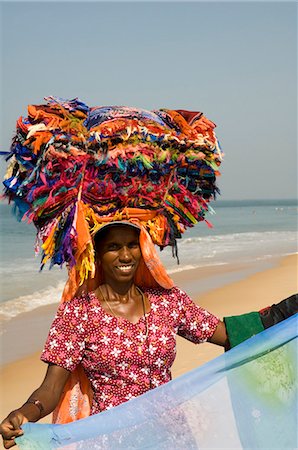 Local vendor selling beach clothing on beach near the Leela Hotel, Mobor, Goa, India, Asia Stock Photo - Rights-Managed, Code: 841-02992207