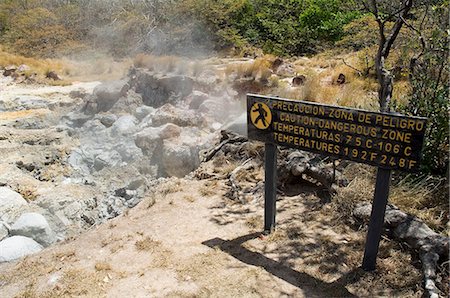 Steaming volcanic mud pools, Rincon de la Vieja National Park, at foot of Rincon Volcano, Guanacaste, Costa Rica, Central America Stock Photo - Rights-Managed, Code: 841-02992562