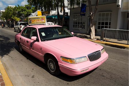 Pink taxis, Duval Street, Key West, Florida, United States of America, North America Stock Photo - Rights-Managed, Code: 841-02993076