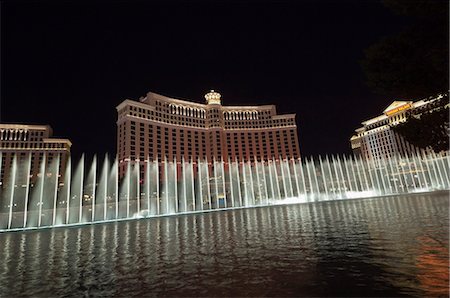 The Bellagio Hotel at night with its famous fountains, the Strip (Las Vegas Boulevard), Las Vegas, Nevada, United States of America, North America Stock Photo - Rights-Managed, Code: 841-03028025