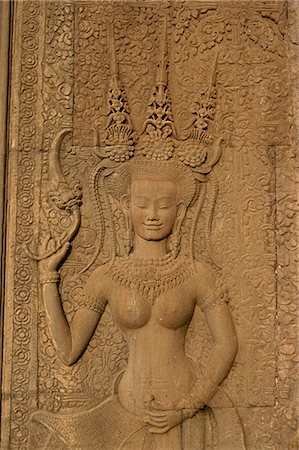 Detail of wall carving depicting an apsara at Angkor Wat, UNESCO World Heritage Site, Siem Reap, Cambodia, Indochina, Southeast Asia, Asia Stock Photo - Rights-Managed, Code: 841-03028828