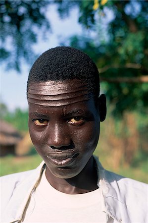 simsearch:841-03674809,k - Head and shoulders portrait of a Nuer man with forehead scarification,Itang region,Ilubador state,Ethiopia,Africa Foto de stock - Con derechos protegidos, Código: 841-03034154