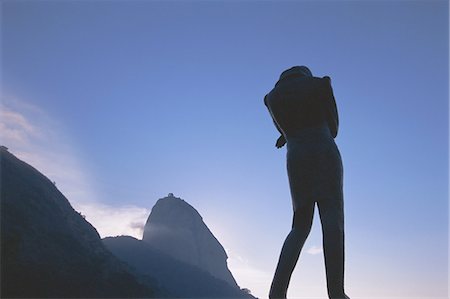 silhouette of man standing in a mountain top - Statue,Sugar Loaf,Rio de Janeiro,Brazil,South America Stock Photo - Rights-Managed, Code: 841-03034762