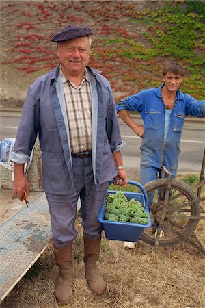 Portrait of two French men standing looking at the camera, one holding a basket of grapes, vignerons, near Nantes, western Loire, France, Europe Stock Photo - Rights-Managed, Code: 841-03030423