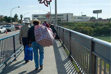 Bridge over the Rio Grande on the border of Mexico at Nuevo Laredo and the U.S.A. at Laredo, Texas, United States of America, North America Stock Photo - Rights-Managed, Code: 841-03031271