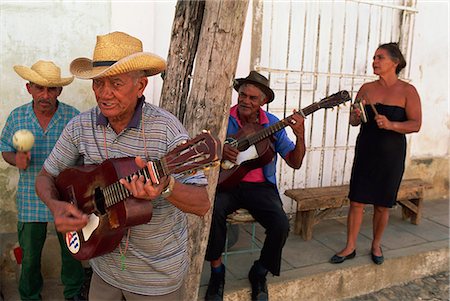 simsearch:841-07081838,k - Group of three elderly men and a woman playing music, Trinidad, Cuba, West Indies, Central America Stock Photo - Rights-Managed, Code: 841-03032765