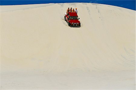 simsearch:841-02709392,k - Beach buggy riding on the sandy dunes of the Ceara' coastline, near Canoa Quedrada, Ceara, Brazil, South America Stock Photo - Rights-Managed, Code: 841-03033725