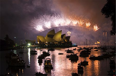 New Years Eve 2006, 75th Diamond Anniversary Firework Celebrations, Opera House, Sydney Harbour Bridge and boats in Sydney Harbour, Sydney, New South Wales, Australia, Pacific Stock Photo - Rights-Managed, Code: 841-03055086