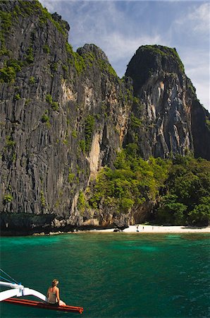 simsearch:841-02899056,k - Island hopping by catamaran around coral fringe in clear waters, Bacuit Bay, El Nido Town, Palawan, Philippines, Southeast Asia, Asia Stock Photo - Rights-Managed, Code: 841-03055175