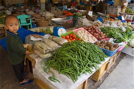 pictures of people in the market in the philippines - Little boy vendor at vegetable stall in food market, Bontoc, The Cordillera Mountains, Mountain Province, Luzon, Philippines, Southeast Asia, Asia Stock Photo - Rights-Managed, Code: 841-03055227