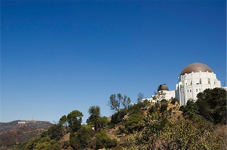 planetarium - Griffiths Observatory and Hollywood sign in distance, Los Angeles, California, United States of America, North America Stock Photo - Rights-Managed, Code: 841-03055322