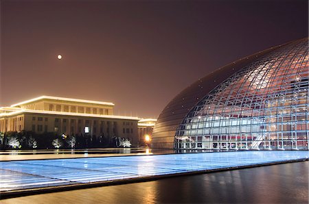 simsearch:841-02710261,k - Full moon above Soviet style Great Hall of the People contrasts with The National Theatre Opera House, also known as The Egg designed by French architect Paul Andreu and made with glass and titanium opened 2007, Beijing, China, Asia Stock Photo - Rights-Managed, Code: 841-03055712