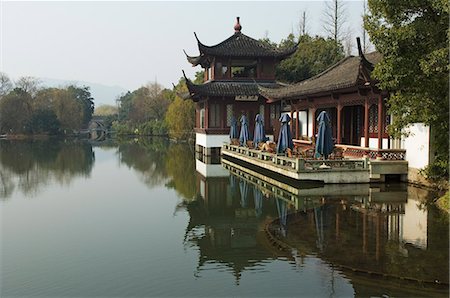 A waterside pavilion at Winding Garden at West Lake, Hangzhou, Zhejiang Province, China, Asia Stock Photo - Rights-Managed, Code: 841-03055900