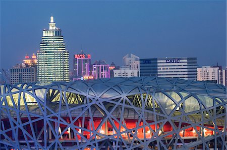 National Stadium in the Olympic Park illuminated at night, Beijing, China, Asia Stock Photo - Rights-Managed, Code: 841-03055985