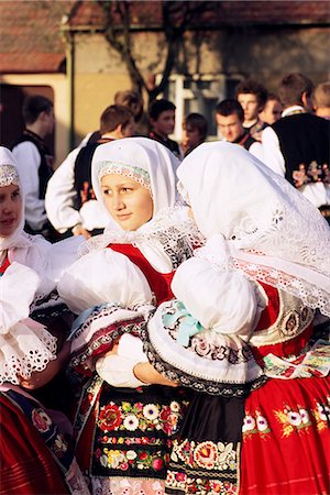 Two girls dancing in traditional dress, Dress Feast with Wreath and Duck Festival, village of Skoronice, Moravian Slovacko folk region, Skoronice, Brnensko, Czech Republic, Europe Stock Photo - Rights-Managed, Code: 841-03056907