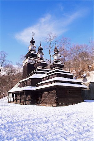 st michael - Snow-coverd Christian Orthodox wooden church of St. Michael dating from the 18th century, transferred to present site from western Ukraine village of Medvedov, Smichov, Prague, Czech Republic, Europe Stock Photo - Rights-Managed, Code: 841-03056916
