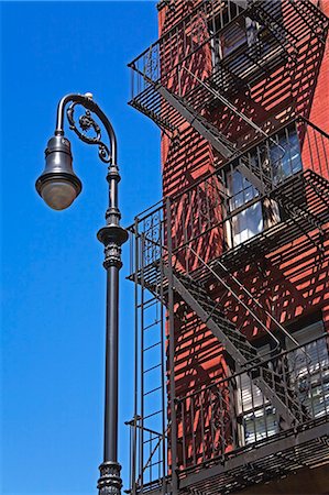 Building fire escape in Greenwich Village, Downtown Manhattan, New York City, New York, United States of America, North America Foto de stock - Con derechos protegidos, Código: 841-03065602