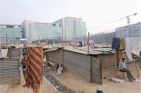 slums - Construction workers' slum, Tech center 50km from Delhi at Gurgaon, Haryana state, India, Asia Stock Photo - Rights-Managed, Code: 841-03066985