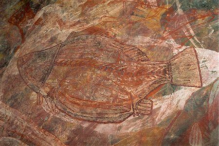 X-ray style fish at the Aboriginal rock art site at Ubirr Rock, Kakadu National Park, where paintings date from 20000 years old to present day, UNESCO World Heritage Site, Northern Territory, Australia, Pacific Stock Photo - Rights-Managed, Code: 841-03067686