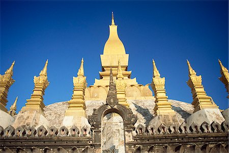 simsearch:841-06501931,k - Stupas at Wat That Luang in Vientiane, Laos, Indochina, Southeast Asia, Asia Stock Photo - Rights-Managed, Code: 841-03067791