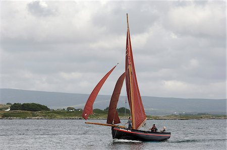 Galway hookers at Roundstone Regatta, Connemara, County Galway, Connacht, Republic of Ireland, Europe Stock Photo - Rights-Managed, Code: 841-03063036
