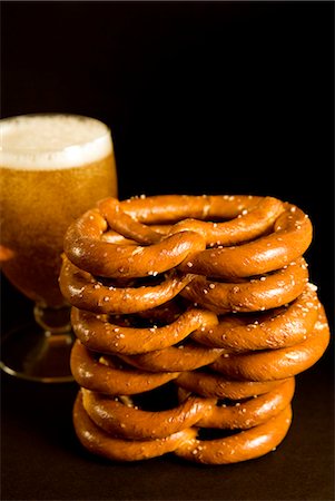 soft pretzel food photography - Austrian prezels, salted biscuits and beer, Austria, Europe Stock Photo - Rights-Managed, Code: 841-03063376