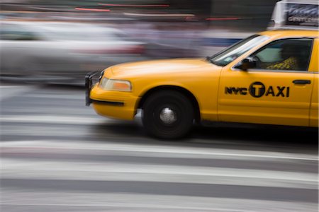 New York taxi cab driving fast over a pedestrian crossing, Manhattan, New York, United States of America, North America Stock Photo - Rights-Managed, Code: 841-03454303