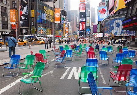 Garden chairs in the road for the public to sit in the pedestrian zone of Times Square, New York City, New York, United States of America, North America Stock Photo - Rights-Managed, Code: 841-03454408