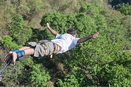 Bungee jumper falling, San Jose, Costa Rica, Central America Stock Photo - Rights-Managed, Code: 841-03489873