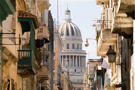simsearch:841-03507904,k - A view of the Capitolio seen through the streets of Habana Vieja (old town), Havana, Cuba, West Indies, Central America Stock Photo - Rights-Managed, Code: 841-03483700
