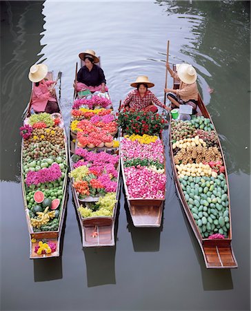 simsearch:841-02705251,k - A group of four women market traders in boats laden with fruit and flowers, Damnoen Saduak floating market, Bangkok, Thailand, Southeast Asia, Asia Stock Photo - Rights-Managed, Code: 841-03505098