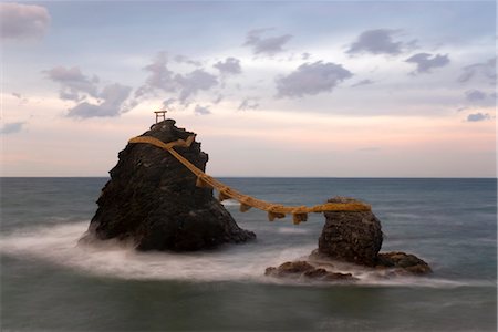 Meoto-Iwa (Wedded Rocks), two rocks considered to be male and female and joined in matrimony by shimenawa (sacred ropes), renewed in a special festival each year, Futami, Ise-Shima, Chubu, Central Honshu, Japan, Asia Stock Photo - Rights-Managed, Code: 841-03505151