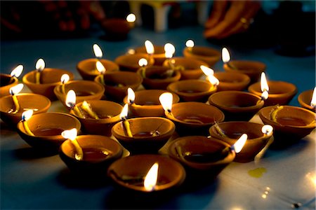 Deepak lights (oil and cotton wick candles) lit for domestic decoration to celebrate the Diwali festival, India Stock Photo - Rights-Managed, Code: 841-03520039
