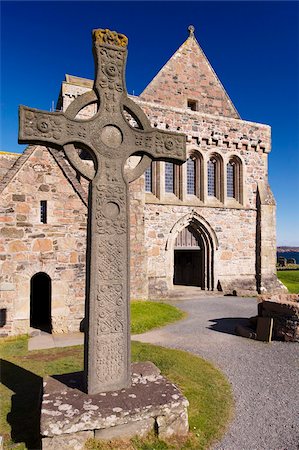 Replica of St. John's cross stands proudly in front of Iona Abbey, Isle of Iona, Scotland, United Kingdom, Europe Stock Photo - Rights-Managed, Code: 841-03674699