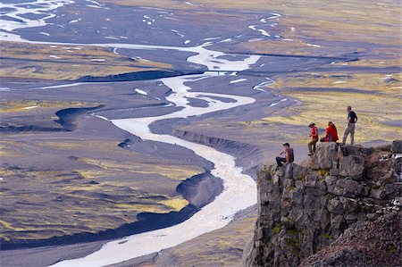 Randonneurs prend un repos au-dessus du glacier de Skaftafellsjokull, Skaftafellsa rivière glaciaire dans le fond, dans le Parc National de Skaftafell, sud-est de l'Islande (Austurland), l'Islande, les régions polaires Photographie de stock - Rights-Managed, Code: 841-03674784