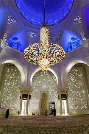 The largest ornate chandelier in the world hanging from the main dome inside the prayer hall of Sheikh Zayed Bin Sultan Al Nahyan Mosque, Abu Dhabi, United Arab Emirates, Middle East Stock Photo - Rights-Managed, Code: 841-03674942