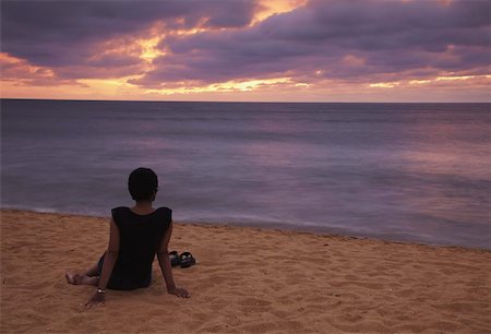 Woman sitting on beach at sunset, Negombo, Sri Lanka, Asia Stock Photo - Rights-Managed, Code: 841-03675223