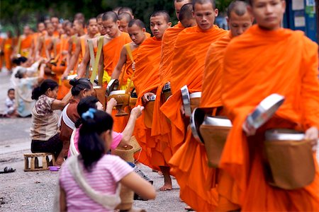 simsearch:841-05845843,k - Monks processing at dawn for alms of rice in Luang Prabang, Laos, Indochina, Southeast Asia, Asia Stock Photo - Rights-Managed, Code: 841-03676049