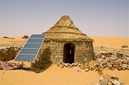 solar energy - Traditional house with a solar panel in the Sahara Desert, Algeria, North Africa, Africa Stock Photo - Rights-Managed, Code: 841-03676338
