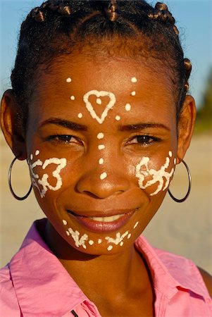 Pretty young girl with little paintings in her face, Morondave, Madagascar, Africa Stock Photo - Rights-Managed, Code: 841-03676745