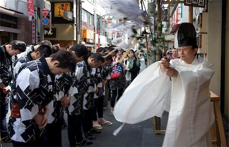Shinto priest blessing a group of Sanja Festival participants in a religious ceremony in Asakusa, Tokyo, Japan, Asia Stock Photo - Rights-Managed, Code: 841-03676967
