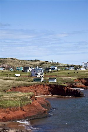 sandstone cliffs - Scalloped red sandstone cliffs with houses perched on the top on the island of Havre-Aubert, Iles de la Madeleine (Magdalen Islands), Quebec, Canada, North America Stock Photo - Rights-Managed, Code: 841-03677085