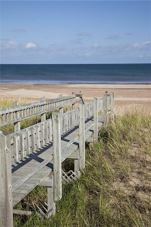 Walkway over fragile ecology at beach on island in the Gulf of St. Lawrence, Iles de la Madeleine (Magdalen Islands), Quebec, Canada, North America Stock Photo - Rights-Managed, Code: 841-03677091