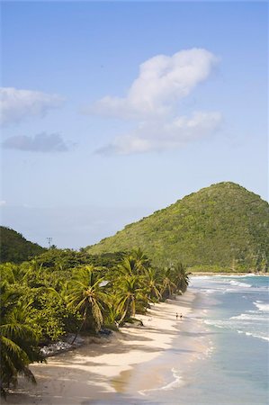 Two women walking on the sandy beach on Long Bay, Tortola, British Virgin Islands, West Indies, Central America Stock Photo - Rights-Managed, Code: 841-03677145