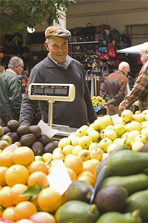 simsearch:841-06805368,k - A fruit stall holder works at the Mercado des Lavradores in central Funchal, Madeira, Portugal, Europe Foto de stock - Con derechos protegidos, Código: 841-03677206
